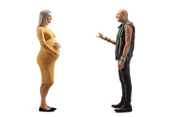 Punk man talking to a pregnant woman