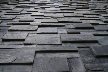 Pieces of stone wall, for background or texture , pattern gray of modern style design , real stone wall with black.