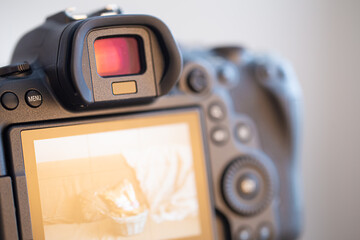 Close up viewfinder of a professional digital camera.