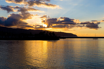 Naklejka premium sunset over the river
