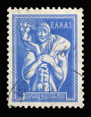 Stamp printed in Greece from the Ancient Greek Art issue shows Man carrying calf (Moschophoros) statue, circa 1955