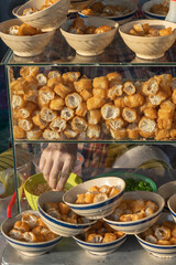 Many fried bread dough - youtiao at at breakfast stall
