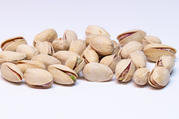 Pistachios nutshell isolated on white background.