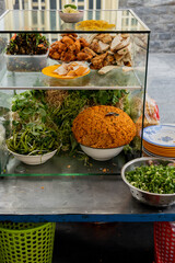 Typical Vietnamese street food stall and ingredients for noodle soup