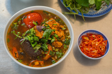 Top view photo of Vietnamese crab paste noodle, Bun Rieu