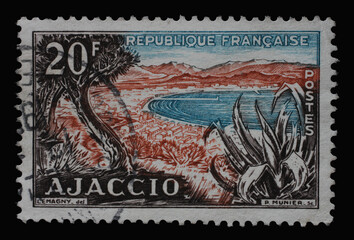 Stamp printed in the France shows beautiful view of Ajaccio - capital city of Corsica. Corsica is an island in the Mediterranean Sea, circa 1954.