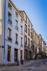 Fototapeta na wymiar facades of the streets of the medieval neighborhood Montferrand in the city of Clermont Ferrand, Auvergne (France)