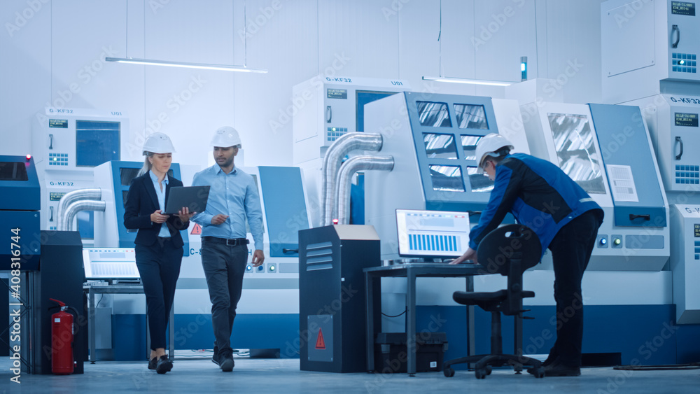Poster female chief engineer and male project manager walk through modern factory, talking and planning opt