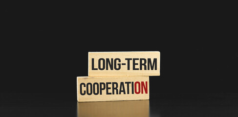 Long-term cooperation conceptual image for businessman and freelancer maded with wooden pegs