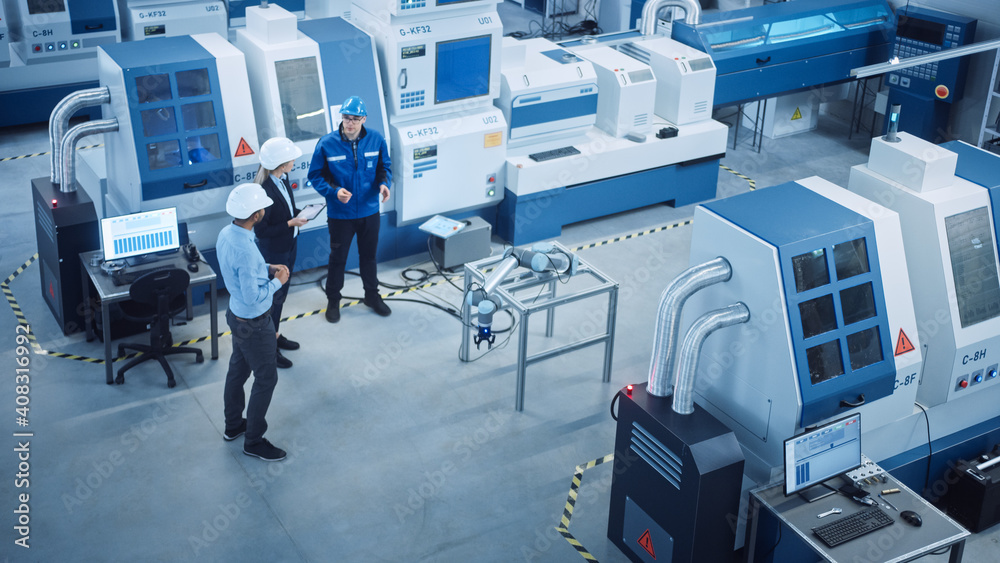 Poster industry four factory: female executive and chief engineer inspect facility workshop, look at robot 