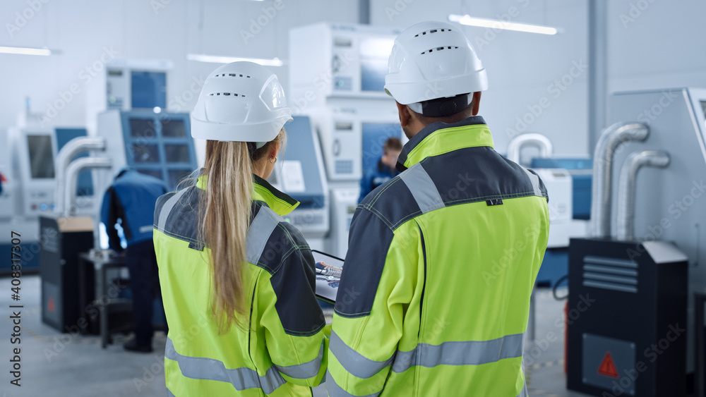 Poster industry 4.0 factory: chief engineer and project supervisor in safety vests and hard hats, talk, use