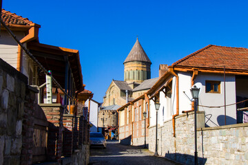 Fototapeta na wymiar Old famous town in Georgia, Mtskheta. Old hauses and church Svetiskhoveli.