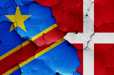 flags of Democratic Republic of Congo and Denmark painted on cracked wall