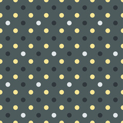 This is a seamless pattern of polka dots on a dark background.