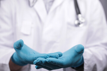 doctor hand blue gloves imedical care