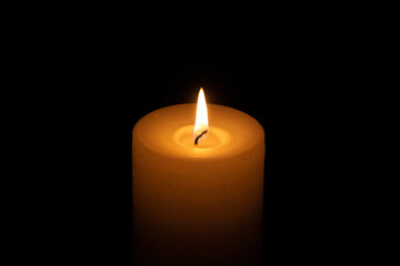 glowing lit candle