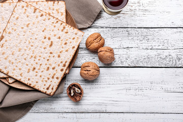 Composition with Jewish flatbread matza for Passover on wooden background