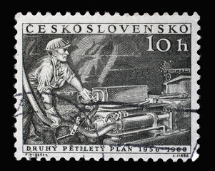Stamp printed in Czechoslovakia shows Miner with drill, 2nd Five-Year Plan, circa 1956
