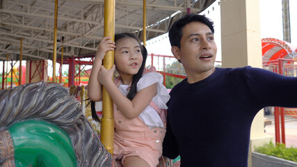 A happy family father and children, daughter, having fun on vacation