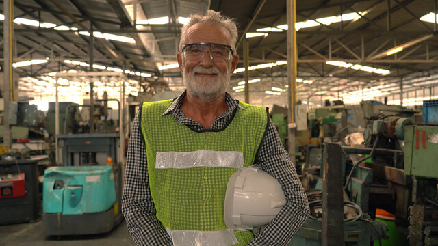 Portrait factory senior man worker