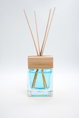 A Bottle of Lavender Fragrant Oil Diffuser with Reed Sticks, isolated on white