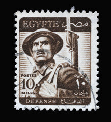 Stamp printed in Egypt shows soldier, circa 1953