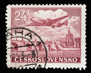 Stamp printed in Czechoslovakia shows Plane over Charles Bridge, Prague, circa 1946