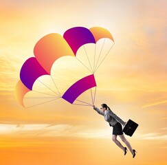 Businesswoman flying on parachute in business concept