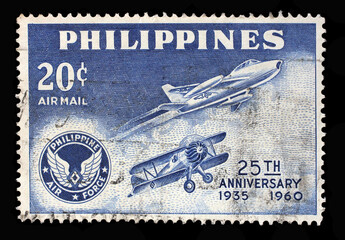 Stamp printed in Philippines shows Air force plane of 1935 and Saber jet, Series 25th Anniversary of Philippines Airforce, circa 1960