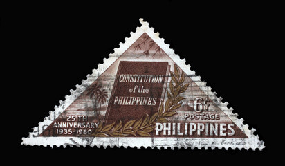 Stamp printed in Philippines issued on the occasion of the 25th anniversary of the Philippine Constitution, circa 1960