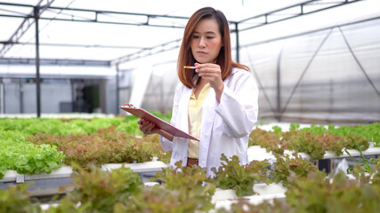 Woman science researching in hydro farm