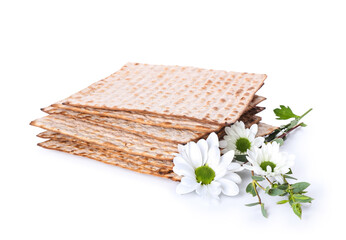 Jewish flatbread matza for Passover and flowers on white background