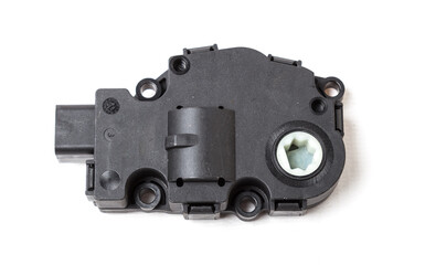 Heater flap motor - spare part and element of car air conditioning system for directing air into the car interior on white isolated background. Auto service industry. Spare parts catalog.