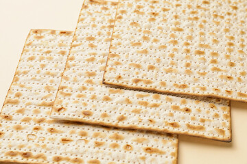 Jewish flatbread matza for Passover on color background