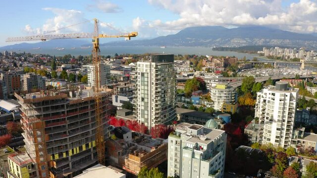 Aerial view of a construction crane in the Vancouver, Canada skyline.