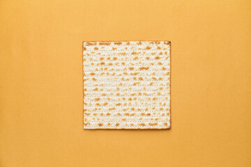 Jewish flatbread matza for Passover on color background