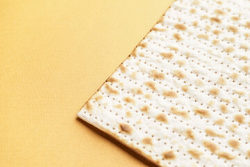 Jewish flatbread matza for Passover on color background