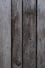 painted plank wall where some boards are left unpainted