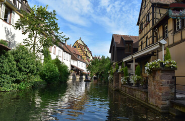 Fototapeta na wymiar Colmar, old picturesque town, the river flowing through the city
