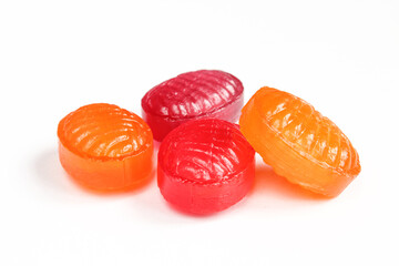 Colorful hard candies isolated on white background. Pile of bonbons