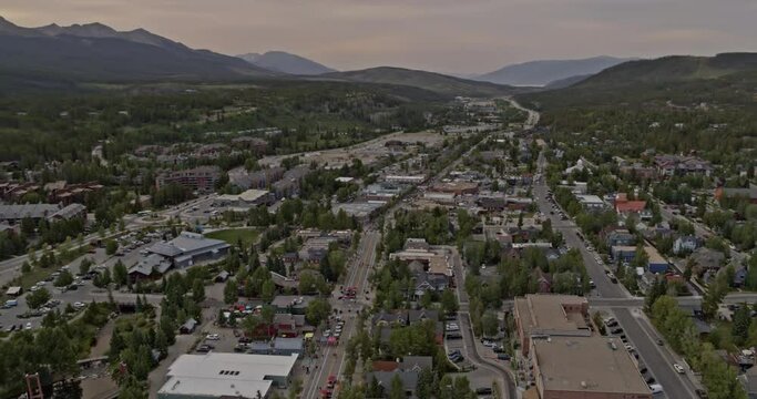 Breckenridge Colorado Aerial v2 scenic birdseye view of town with sunset behind the mountains - Shot on DJI Inspire 2, X7, 6k - August 2020