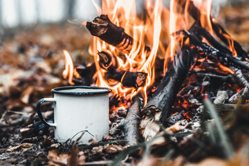 Making coffee at the stake. Make coffee or tea on the fire of nature. Burned fire. A place for fire. - 408335724