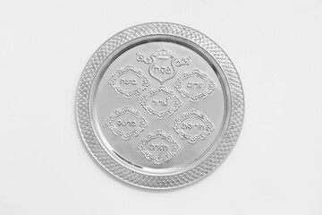 Passover Seder plate on white background