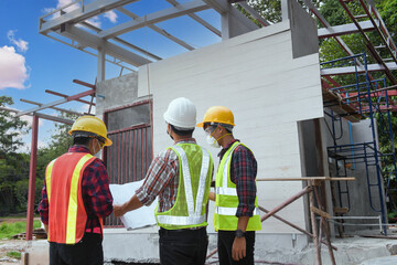 Roofer Construction worker install new roof,Roofing tools,Electric drill used on new roofs with Metal Sheet.