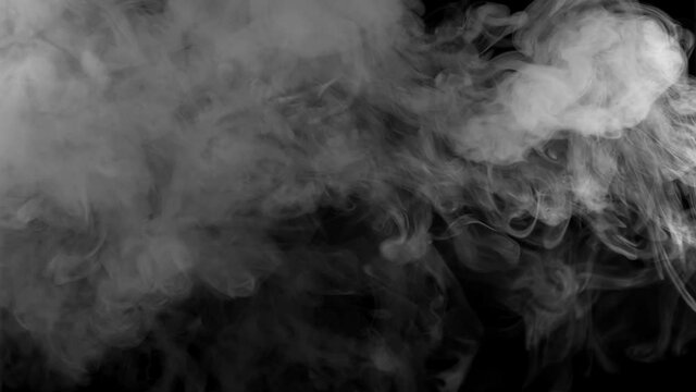 Smoke stream on a dark background slow motion