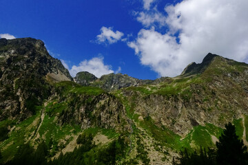 wonderful mountains with blue sky and clouds in the summer