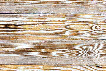 Old shabby boards of light color with a bright invoice.