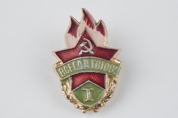 soviet metallic badge on white background