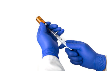 a doctor fills a syringe with an injection vaccine