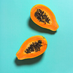 Papaya fruit slices blue background Healthy food flatlay